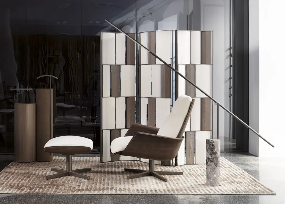 Giorgetti Clori swivel with spoke base leather footstool, photographed for the catalogue